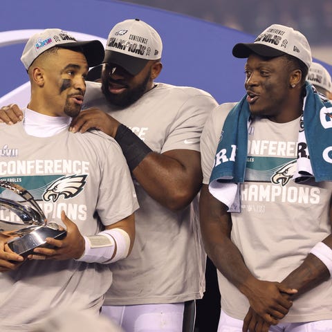 Philadelphia Eagles quarterback Jalen Hurts (left)