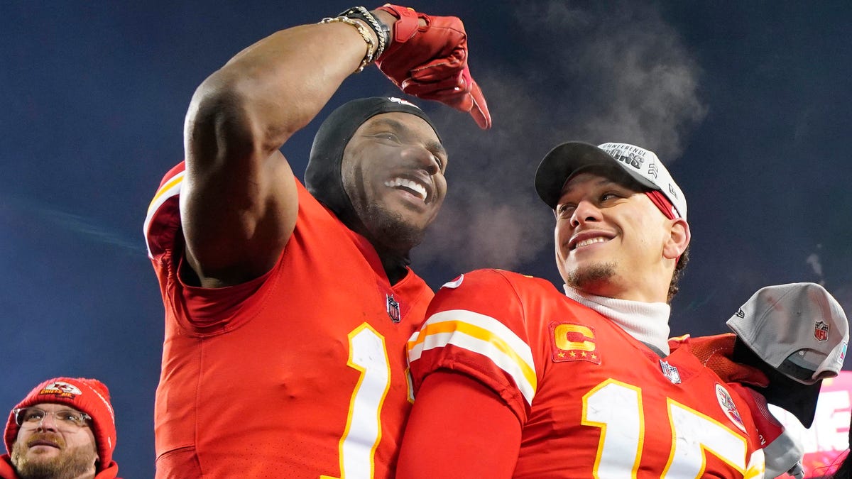Kansas City Chiefs wide receiver Marquez Valdes-Scantling (left) and quarterback Patrick Mahomes (right) celebrate after winning the AFC Championship game against the Cincinnati Bengals.