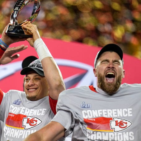 Patrick Mahomes and Travis Kelce celebrate the Chiefs' win in the AFC championship game.