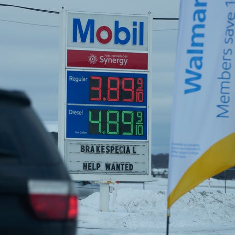 Gas prices are displayed at a Mobil gas station in