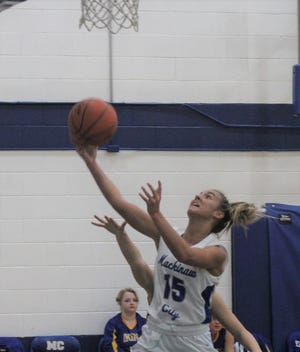 Mackinaw City senior Marlie Postula (15) scored 25 points to help lead the Comets to a road victory at Ellsworth on Monday.