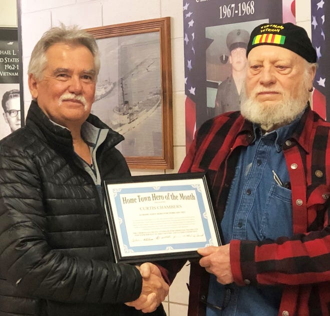 Navy veteran Curtis Chambers (left) was recently named Cheboygan County's Hometown Hero for the month of February.