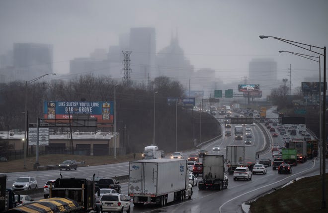 Traffic makes it way along Interstate 40 near Fesslers Lane in Nashville on Tuesday. A winter weather advisory will be in place from 6 p.m. Tuesday through 11 a.m. Wednesday as more freezing rain, sleet and ice are possible.