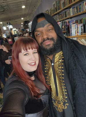 Ohio author Chelsea Banning got a visit from people dressed as characters of her book, "Of Crowns and Legends," at the book's second signing event held Jan. 28 in Ashtabula, Ohio. David Jackson, who goes by Caged Bishop Cosplay, attended the event as Sir Jabir.