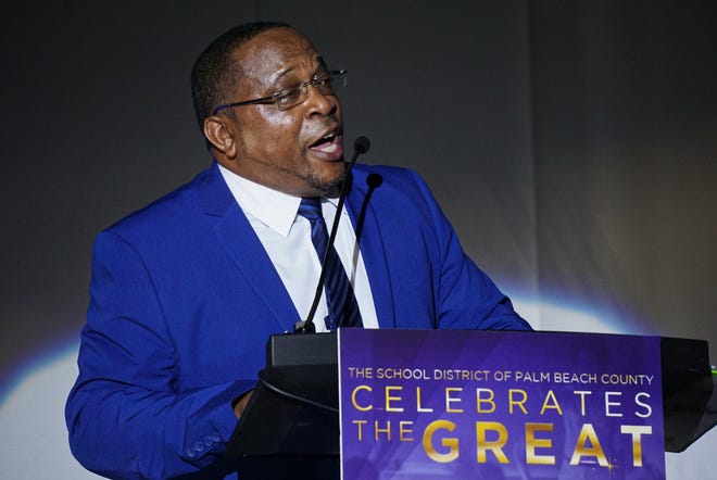 Dwayne Dennard, of Pahokee Middle-Senior High School, accepts the principal of the year award at Celebrate the Great 2023, an event hosted by the School District of Palm Beach County and the Education Foundation of Palm Beach County.