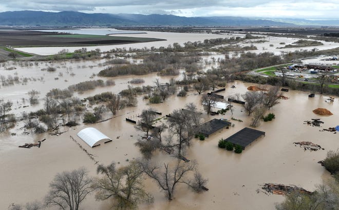 Floodwaters cover an agriculture area in California after the Salinas River overflowed its banks as atmospheric rivers pounded California in January. (Photo by Justin Sullivan/Getty Images)