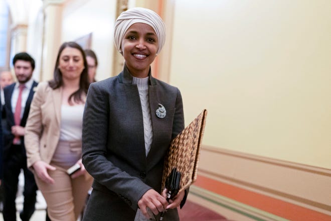 Rep. Ilhan Omar, D-Minn., leaves the House chamber at the Capitol in Washington, Thursday, Feb. 2, 2023. House Republicans have voted to oust Omar from the House Foreign Affairs Committee. The vote in a raucous session on Thursday to remove the Somali-born Muslim lawmaker came after her past comments critical of Israel. 