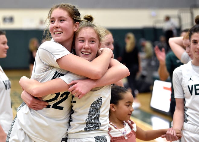 Winning hugs, Venice's Zoe O'Learly and Tessa O'Leary, celebrate a 58-45 victory over Sarasota High in the Class 7A-District 12 championship at the Teepee in Venice.