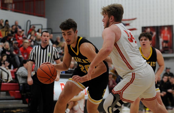 Paint Valley's Dax Estep (#20) drives toward the basket during a game against Piketon on Feb. 3, 2023. Estep scored a game-high 17 points as the Bearcats went on to defeat the Redstreaks 65-31.