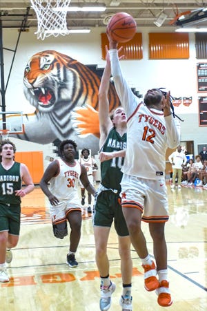 Mansfield Senior's Karion Lindsay drives to the basket during the Tygers' 58-50 win over Madison.