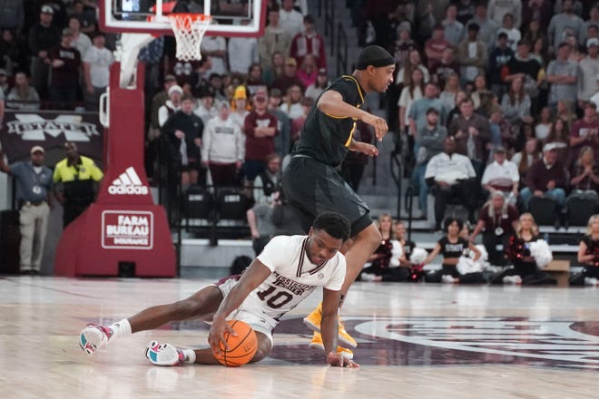 Feb 4, 2023; Starkville, Mississippi, USA; Mississippi State Bulldogs guard Dashawn Davis (10) recovers a loose ball against Missouri Tigers guard Isiaih Mosley (11) during second half at Humphrey Coliseum. Mandatory Credit: Matt Bush-USA TODAY Sports