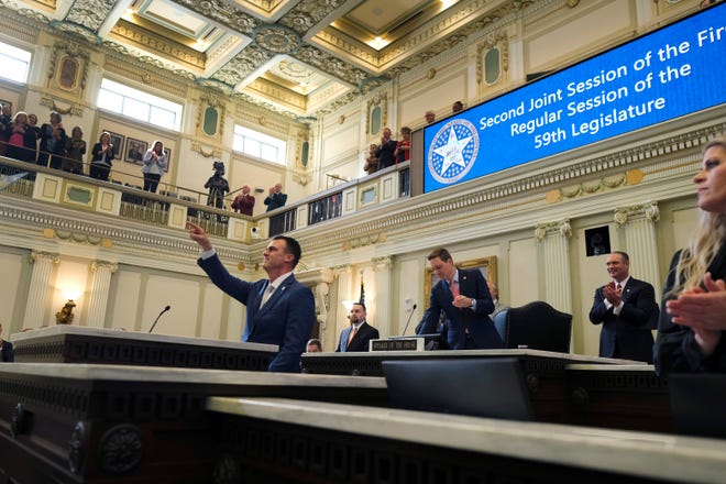 Gov. Kevin Stitt acknowledges someone in the gallery Monday during his State of the State speech.