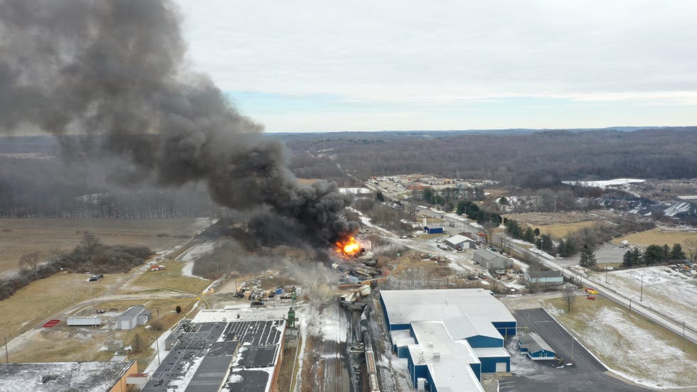 A drone image shows portions of a Norfolk and Southern freight train that derailed Friday night in East Palestine, Ohio, were still on fire midday Saturday.