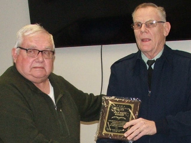 Jim Shaw, president of the Cambridge Amateur Radio Association presents Dick Wayt with the organization’s Amateur of the Year Award for 2022, also known as the Ham of the Year or HOTY Award. Wayt is the ARRL Guernsey County emergency coordinator and a trustee of the organization. The association is looking for new members and hold an election of 2023 officers at its next meeting, scheduled for 10 a.m.  Feb. 25 in the Guernsey County Administration Building.