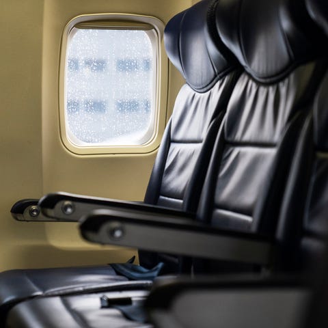 Seats are vacant aboard a Southwest airplane befor