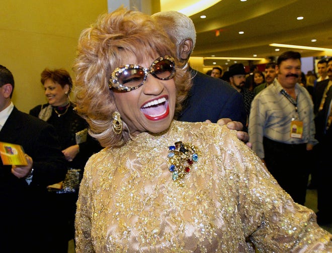 In this Sept. 17, 2002 file photo, Cuba's Celia Cruz arrives for a tribute in honor of Mexico's Vicente Fernandez as the 2002 Latin Recording Academy person of the year in the Hollywood section of Los Angeles.