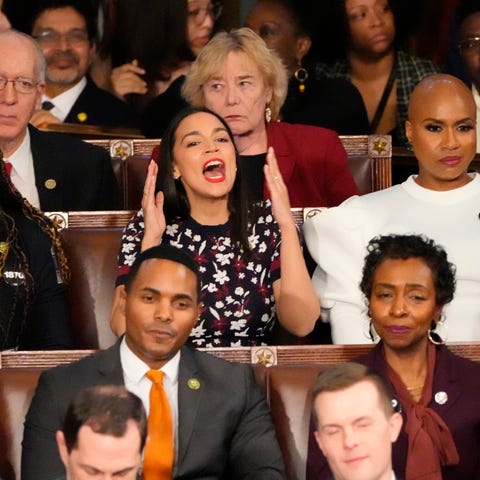 Rep. Alexandria Ocasio-Cortez, D-NY, yells as Pres