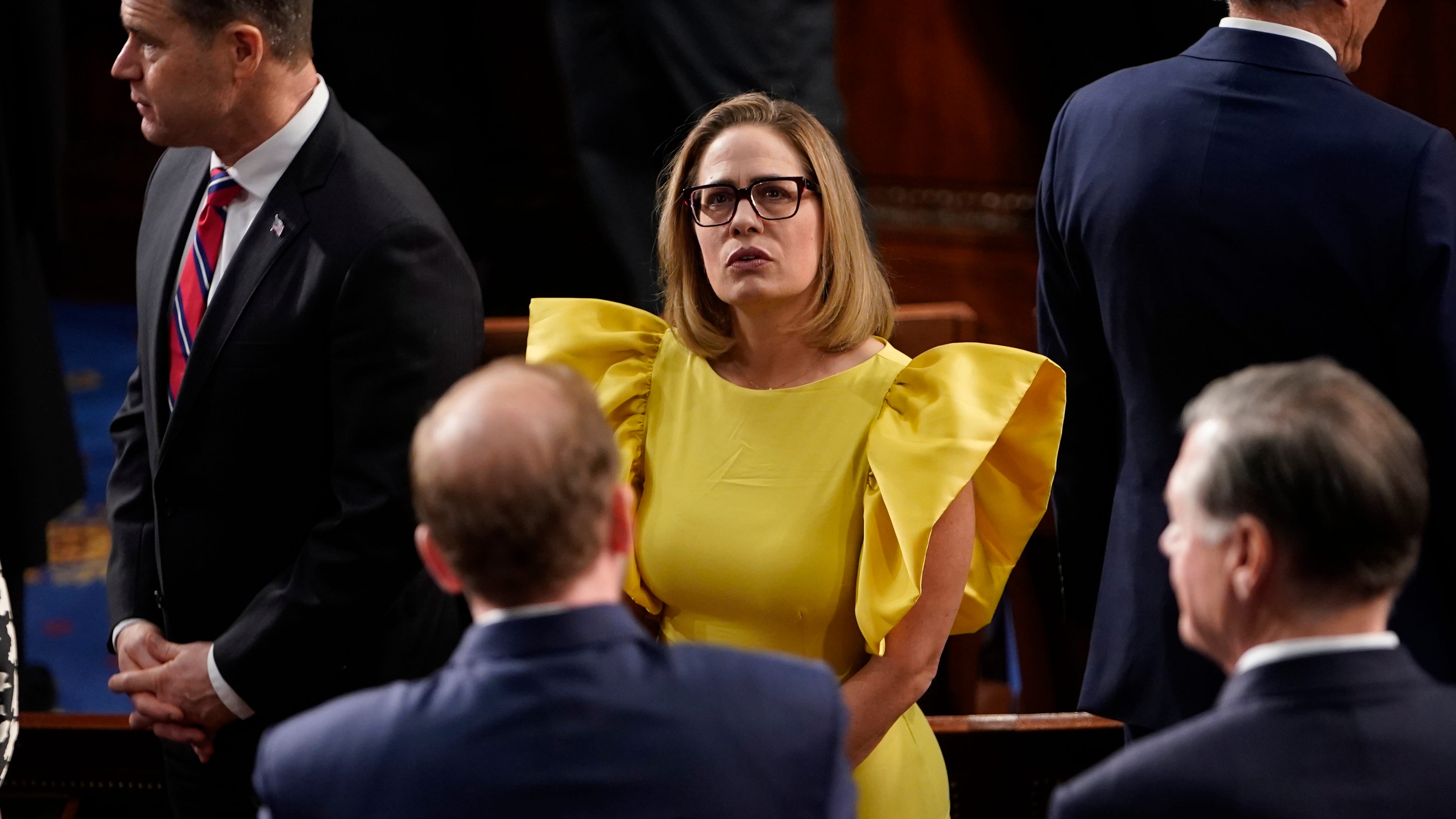 Kyrsten Sinema, I-Ariz., arrives before the State of the Union address from the House chamber of the United States Capitol in Washington.