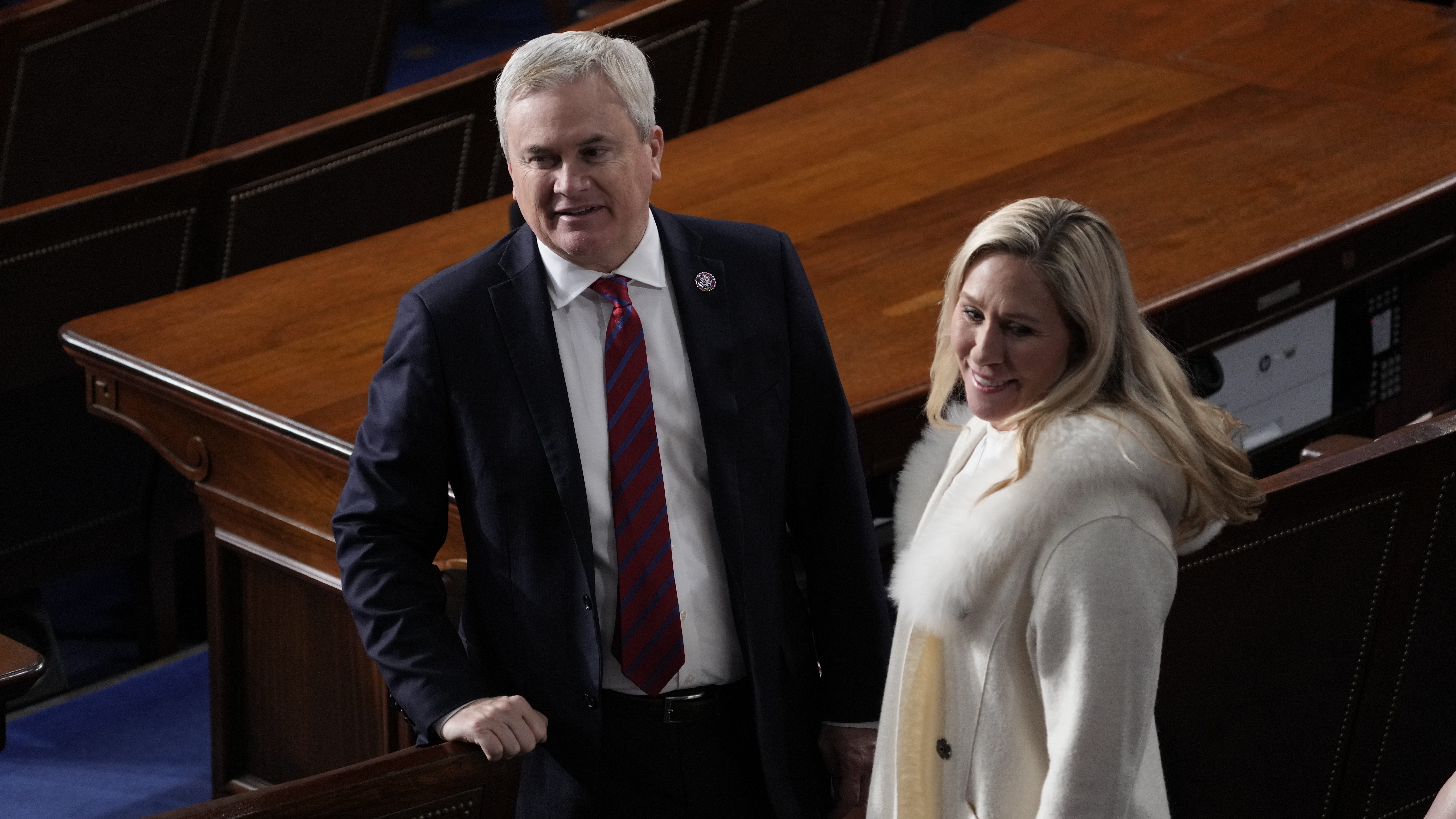 Feb 7, 2023; Washington, DC, USA; Rep. James Comer, R-KY, and Rep. Marjorie Taylor Greene, R-GA, arrive ahead of the State of the Union address from the House chamber of the United States Capitol in Washington.