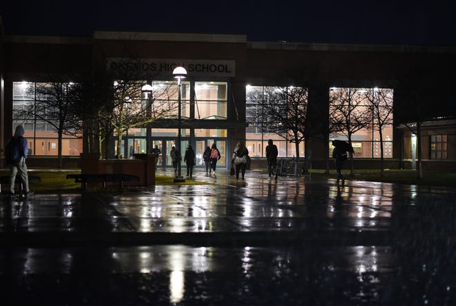 Okemos High School students return to school Thursday morning, Feb. 9, 2023. The school district canceled all classes on Wednesday after Tuesday's hoax 911 call of a shooting at the school.