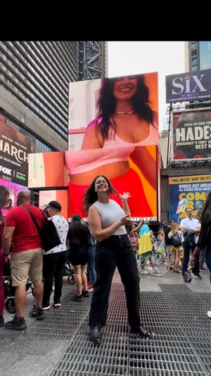 Karah Katenkamp said it was thrilling and emotional to see her face on a giant electronic billboard in New York City’s Times Square. She was modeling for Aerie, a division of American Eagle.