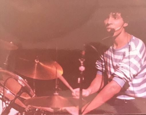 A young Juan Molina shown on drums back when he played on bands in Athens.