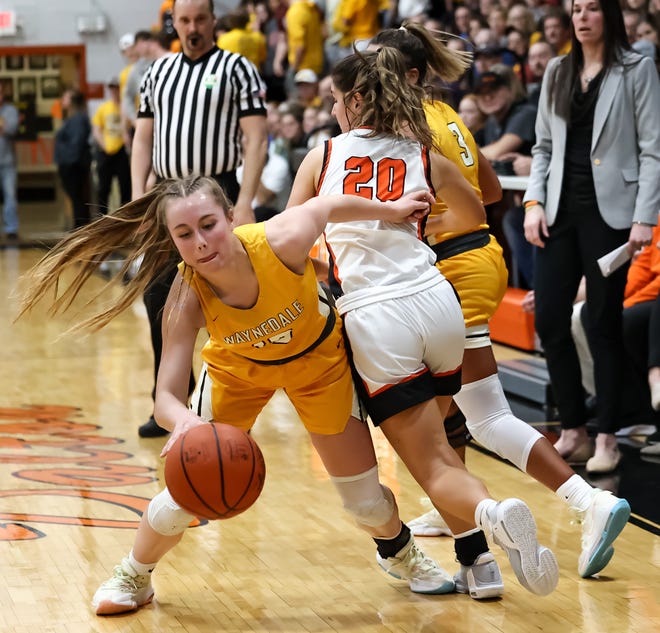 Waynedale's McKenna Baney sidesteps Dalton's Sarah Witmer, who is trying to keep up with Golden Bear's Addesa Miller (3).