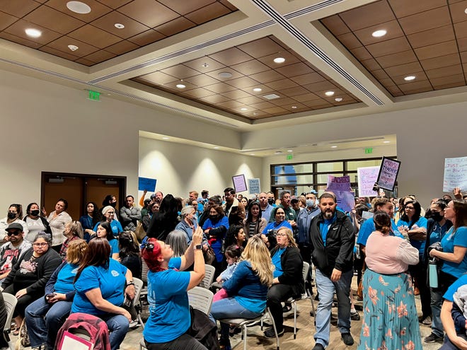 Dozens of Coachella Valley Unified teachers and staff protested pay to the Board of Trustees in Thermal, Calif., Feb. 9, 2023.