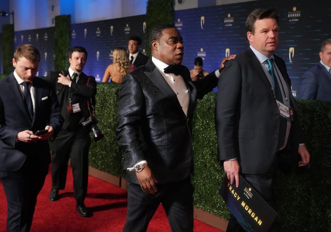 Comedian Tracy Morgan walks the red carpet before the NFL Honors awards special at the Phoenix Convention Center on Thursday, Feb. 9, 2023.