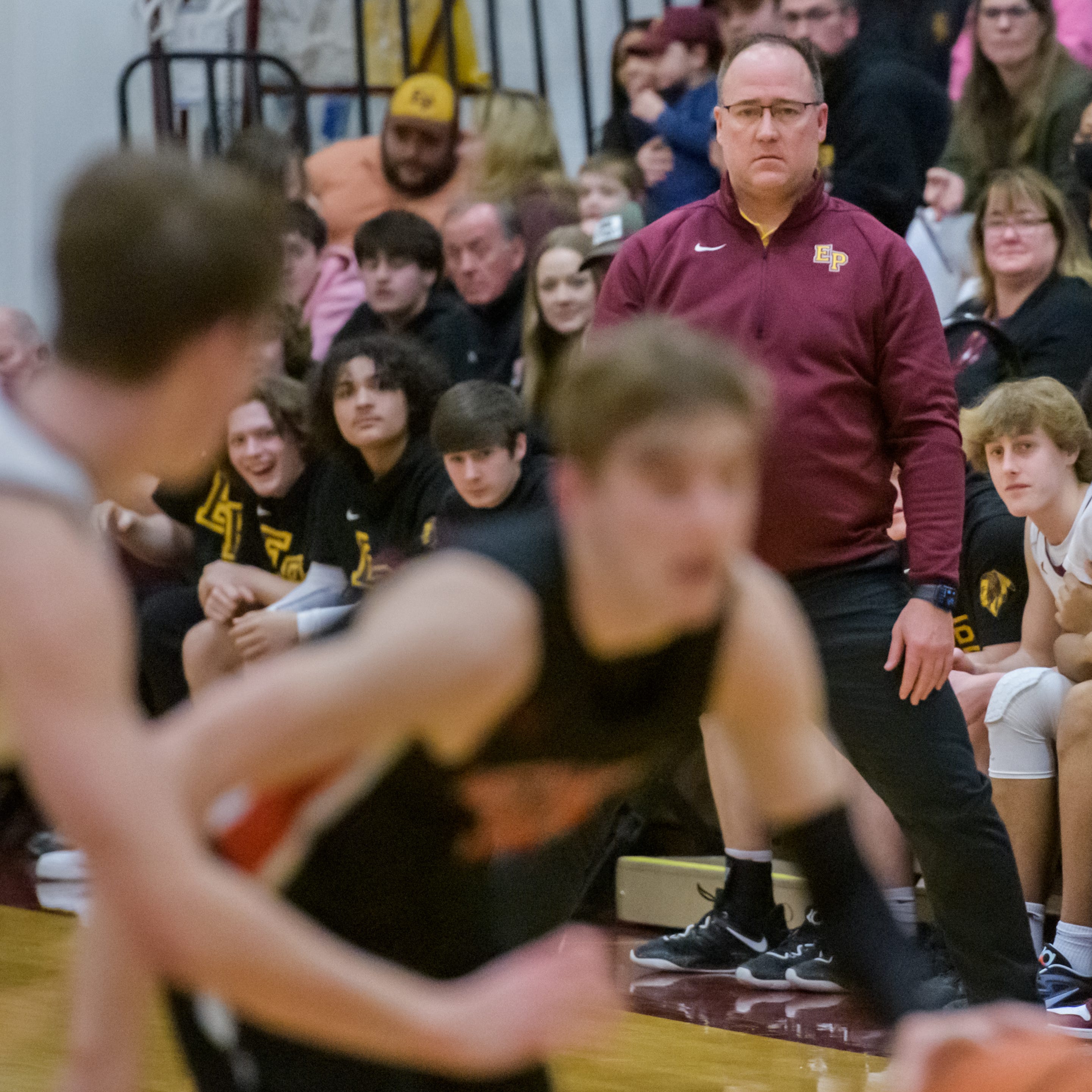 East Peoria head coach Jon Grzanich watches the action as the Raiders battle the Metamora Redbirds in the second half Friday, Feb. 10, 2023 at East Peoria High School. The Redbirds defeated the Raiders 60-50.
