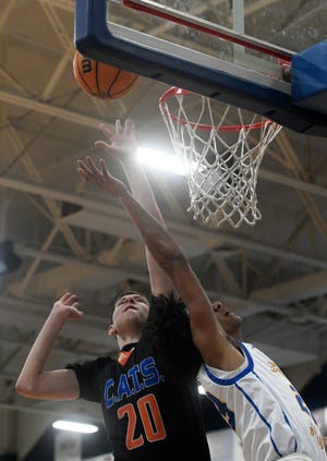 San Angelo Central's Kollin Allbright, left, goes for a rebound with Frenship's Patton Pinkins in a District 2-6A basketball game, Friday, Feb. 10, 2023, Tiger Pit in Wolfforth.