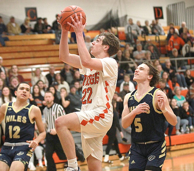 Connor Thomas soars in to score two points for Sturgis against Niles on Friday.