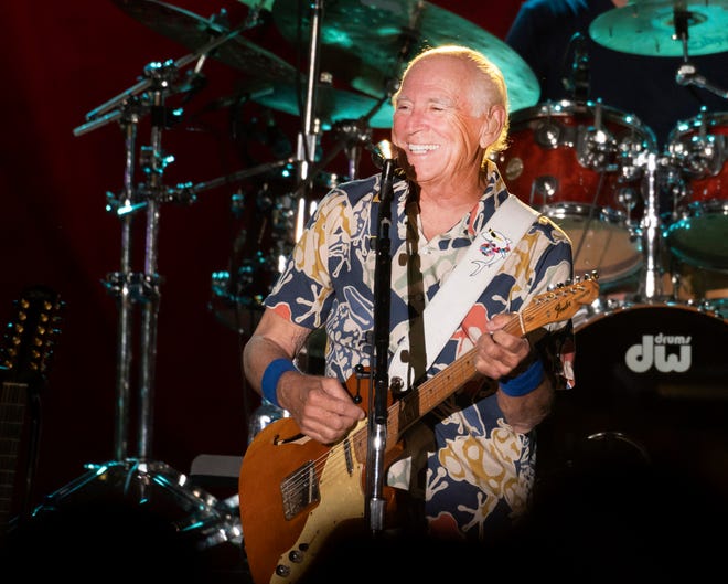Jimmy Buffett interacts with the sold-out crowd at the Coffee Butler Amphitheater in Key West, Florida.