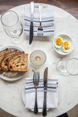 A plat of bread + butter and Jammy Egg at Late Air Wine Bar.