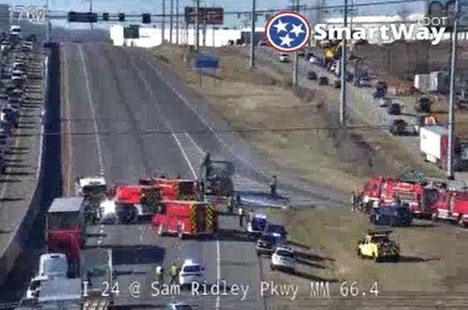A vehicle fire shut down I-24 westbound in Smyrna at Sam Ridley Parkway on Monday.