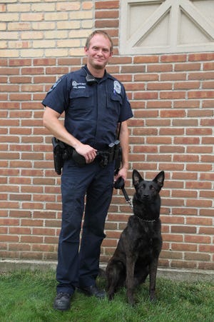 Officer Joel Reimink with K9 partner Ruthie. Reimink was named the 2023 Police Officer of the Year for the Holland Department of Public Safety.