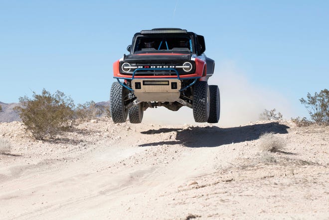 On the desert course in California, Detroit News Auto Critic Henry Payne takes a jump in the Ford Bronco DR racing SUV, the beast's Multimatic shocks absorbing the impact after flying 30 feet.