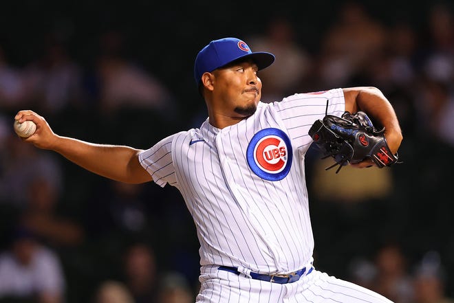 Jeremiah Estrada of the Chicago Cubs delivers a pitch during the ninth inning against the Cincinnati Reds at Wrigley Field on September 7, 2022 in Chicago.