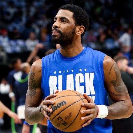 Feb 13, 2023; Dallas, Texas, USA;  Dallas Mavericks guard Kyrie Irving (2) warms up before the game against the Minnesota Timberwolves at American Airlines Center.