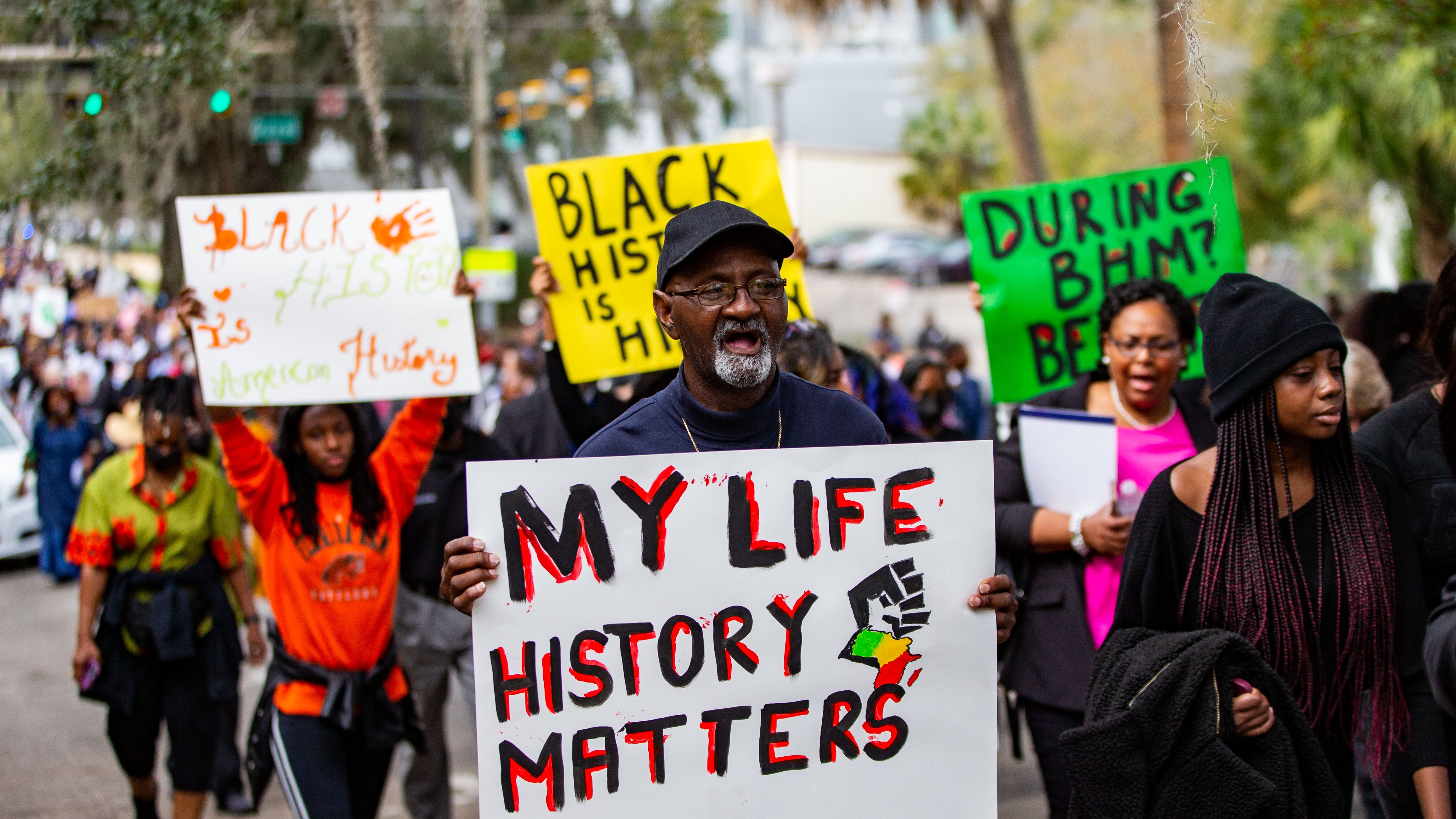 Hundreds participated in the National Action Network demonstration in response to Gov. Ron DeSantis's efforts to minimize diverse education. The activists chanted and carried signs while making their way from Bethel Missionary Baptist Church in Tallahassee, Florida to the Capitol building Wednesday, Feb. 15, 2023.