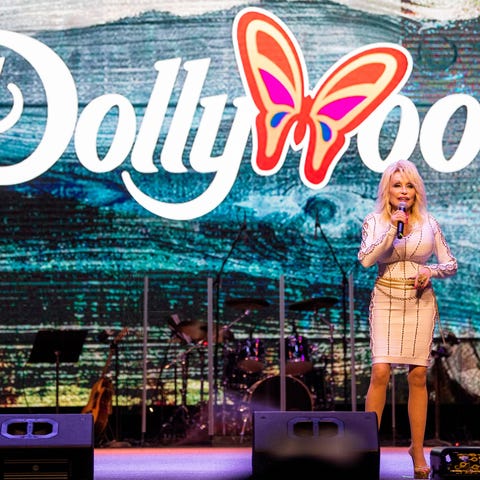Dolly Parton speaks during an opening day event at