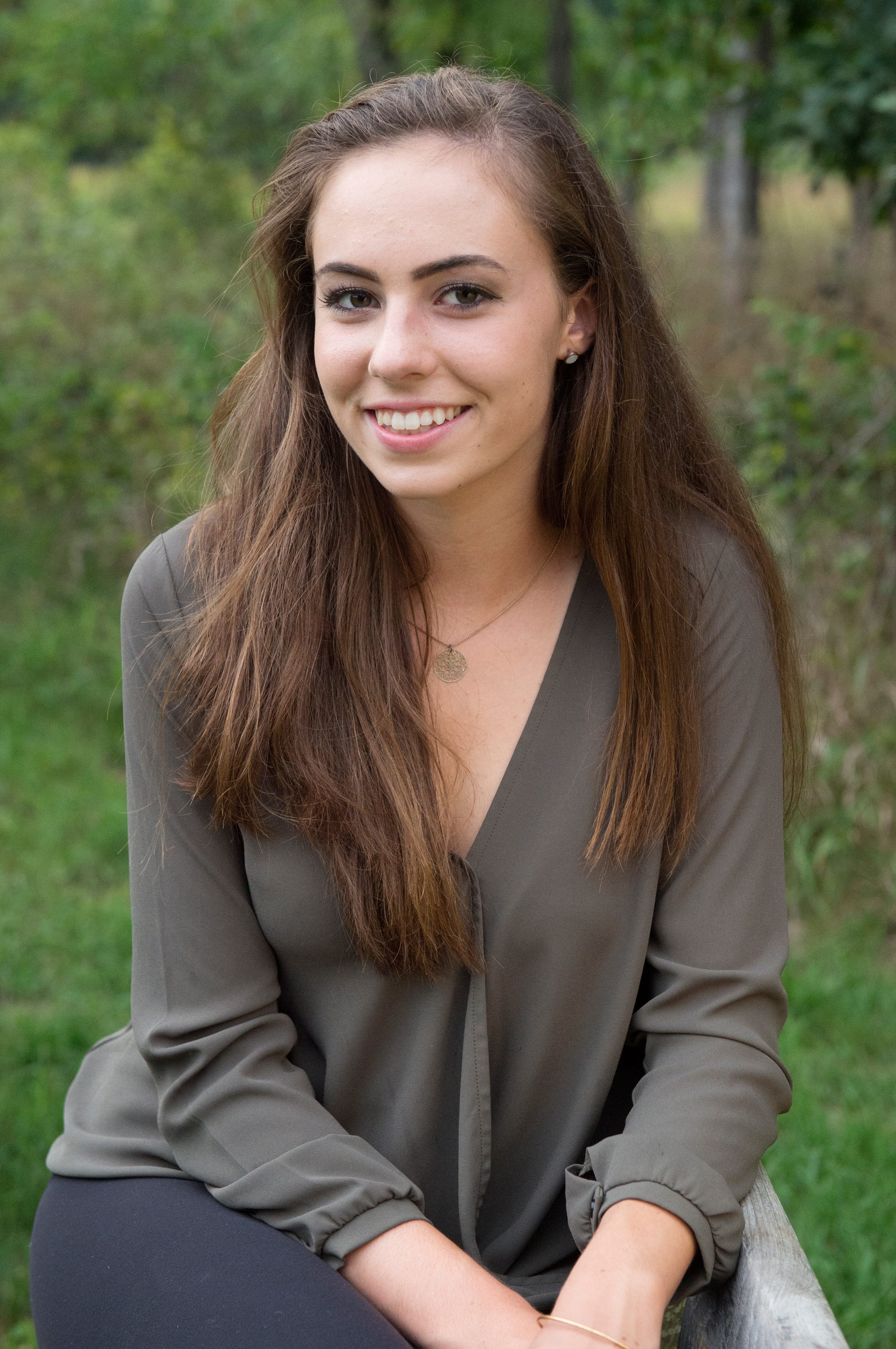 Senior photos captured Quinn Moffett’s enthusiasm as she finished high school. Friends described her as spontaneous and adventurous, with a contagious laugh.