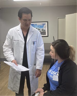 Dr. Jonathan Le, of Southeastern Spine and Pain of Waynesboro, sees patients needing pain management at Jefferson Hospital's specialty clinic.