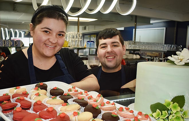 Owners Erica Couto and Andrew Ferreira at Europa Pastries & Coffee Shop on Columbia Street in Fall River.