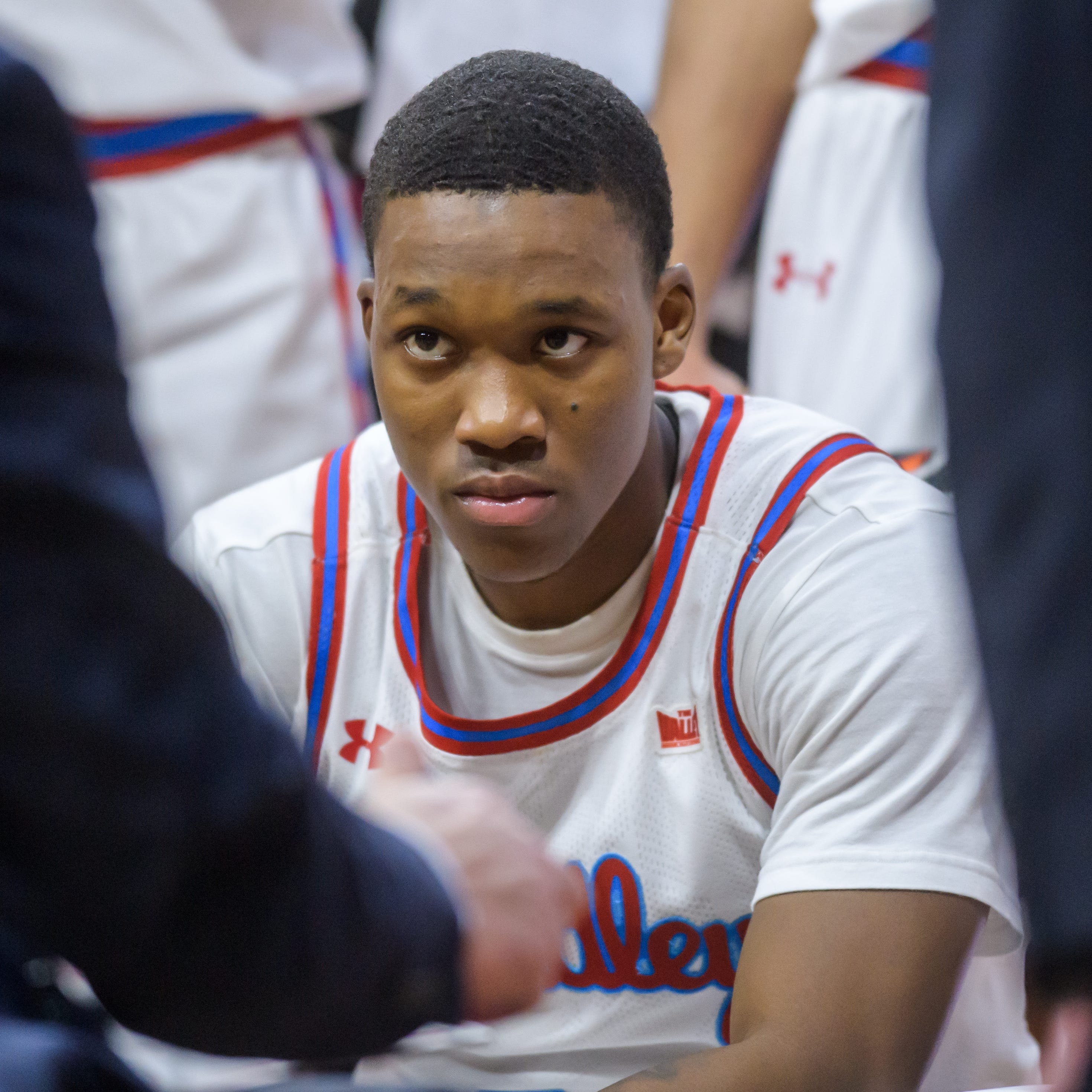 Bradley's Duke Deen listens intently to head coach Brian Wardle during a timeout in the second half Wednesday, Feb. 15, 2023 at Carver Arena. The Braves defeated the Missouri State Bears 64-54.