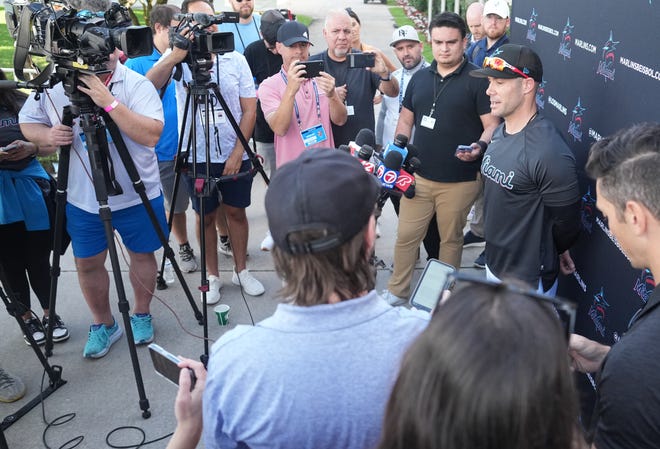 Miami Marlins new manager Skip Schumaker address reporters Thursday at the spring training facility in Jupiter.