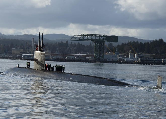 The USS Key West (SSN 722) transits the Puget Sound before mooring at Bremerton on Feb. 10. The Los Angeles-class submarine is scheduled for decommissioning at the Puget Sound Naval Shipyard this year after its 35 years of service.