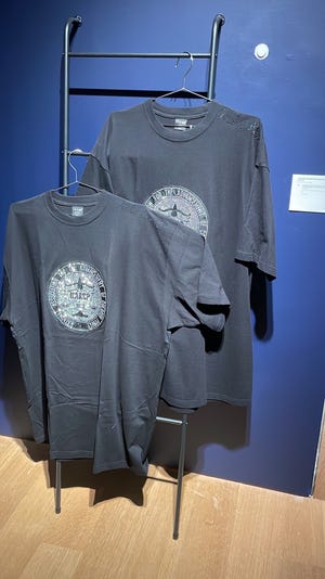 Bedazzled NAACP T-shirts Talley wore for the 2010 Met Gala.