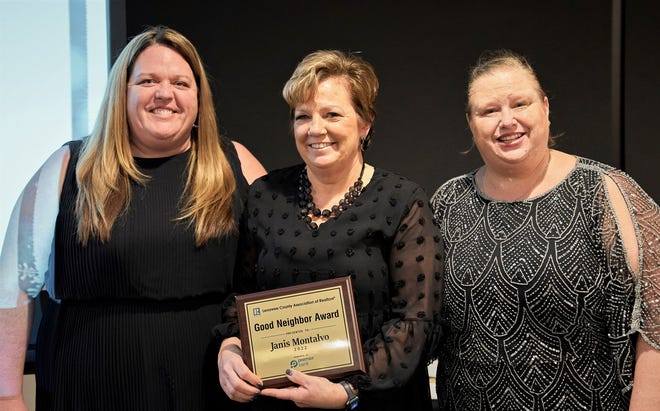 Janis Montalvo, center, was the 2022 recipient of the Good Neighbor Award, sponsored by Premier Bank and awarded during the Lenawee County Association of Realtors annual awards banquet in January. Pictured with Montalvo are 2022 LCAR President Danielle Stepp, left, and 2023 LCAR President Kasey White, right.