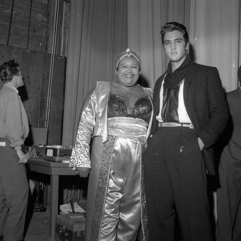 Willa Monroe poses for a photo with Elvis Presley 